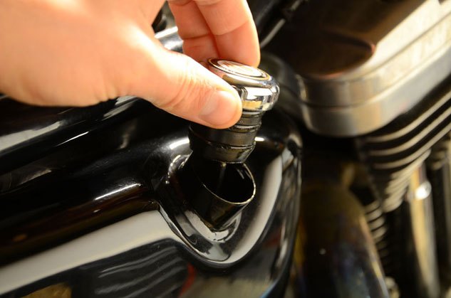 Start the oil change by venting the system, and remove the oil filler ...