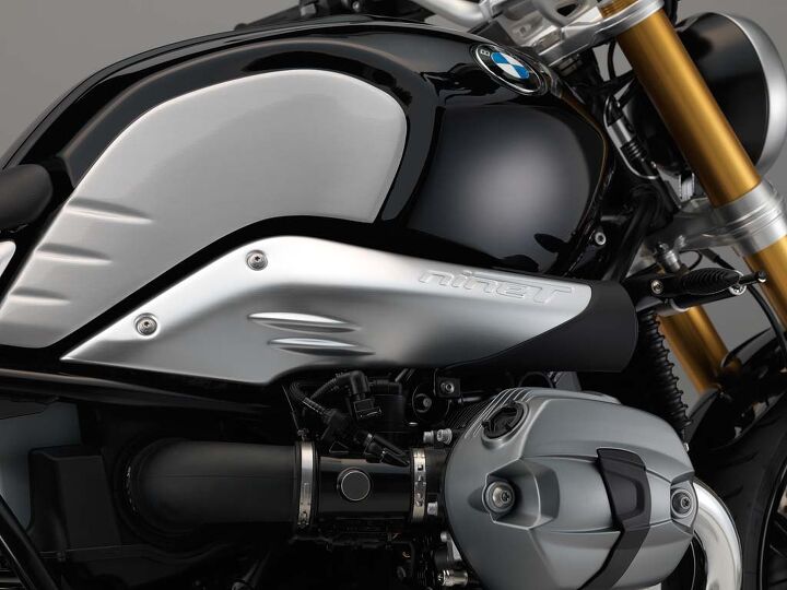 The intake ducting’s brushed aluminum is embossed with nineT and some speed lines that mirror those on the tank.