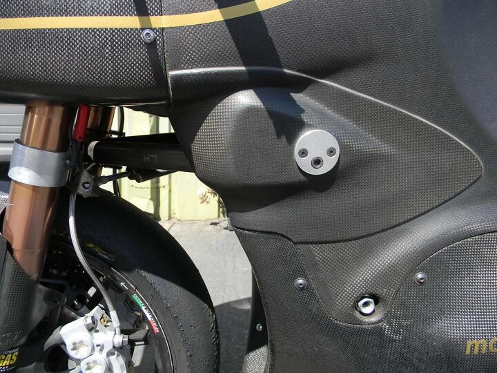 Fork dive can be controlled by the A-arm pivot angle. The plate grafted to the side of the fairing was added to extend the range of adjustability because Taylor’s test rider, Shawn Higbee, had reached the limits of the original design.