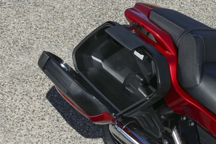The lockable, 35-liter saddlebags are nicely styled and easily accessible but not large enough to hold a full-face helmet (and there’s no helmet lock). While there’s no quick-release mechanism, the bags are removable via two internal bolts.