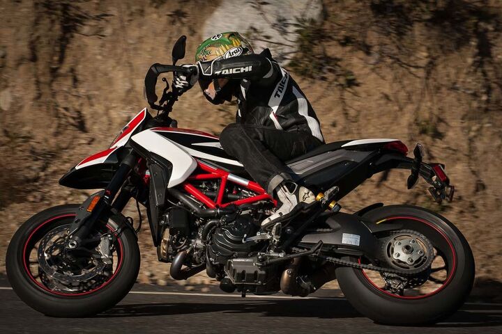 The Hypermotard SP, with its endless amounts of ground clearance, is perfectly comfortable leaning over. Spending an extra $3000 for the SP over the standard will get you a trick paint job, upgraded suspension, carbon bits, forged wheels, Pirelli Supercorsa SP tires, and tweaks to the ABS and ride modes. 
