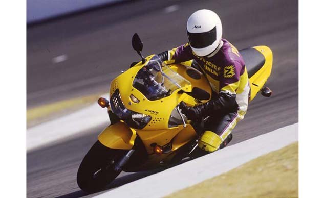 1998 Honda CBR900RR Yellow action 1