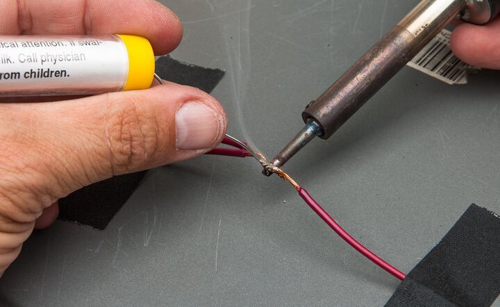 An example of ideal iron, wire and solder placement: The heat is transferred to the wire which, in turn, heats the solder to its melting point.