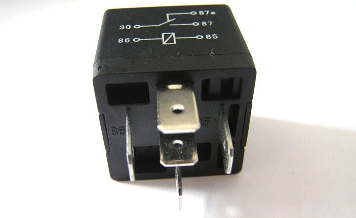 The pins on the relay are numbered for you to connect in the following way: 86. the switched power source; 85. the chassis ground; 30. the positive lead on the 15-amp circuit I want to power; 87. to the accessory plug itself. (Some relays also have a terminal 87a which allows power to pass through the relay when the switched power was off and isn’t applicable, here.)