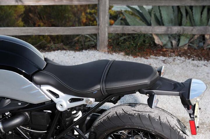 The nineT’s seat is quite attractive, especially with its hand-sewn white stitching and the forged aluminum brackets which support the midsection of the saddle.