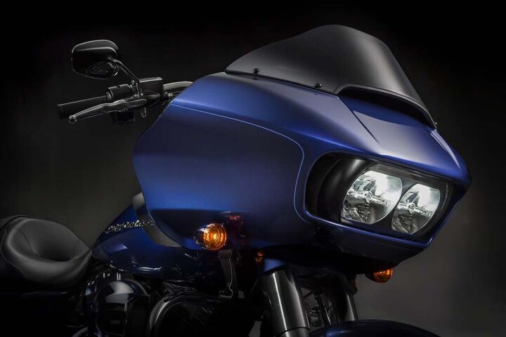 The new Road Glide retains the classic shark-nose shape, but its twin headlights are now LED units behind a single Plexiglas front cover, with air intakes on either side.