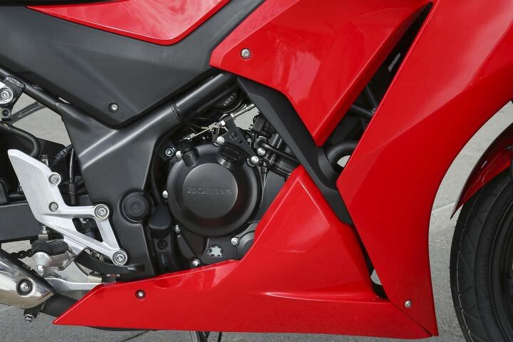 Underneath that revised bodywork lies the same basic Single from the CBR250R. A longer stroke turns the 249cc Thumper into a 286cc Thumper.