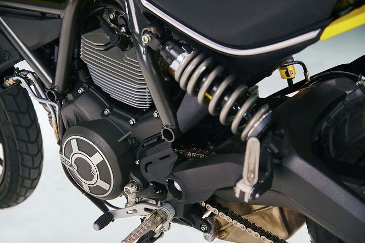 The Scrambler’s aluminum swingarm acts directly on a preload-adjustable shock. Interestingly, a gray shock spring is used rather than Ducati’s traditional yellow springs.