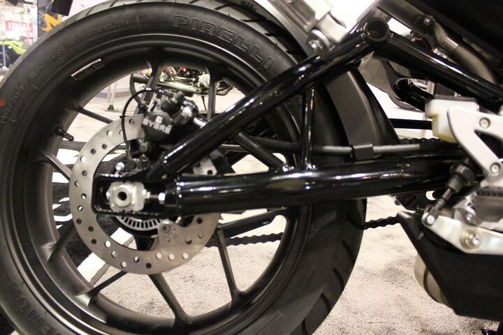 The tubular steel swingarm features trellis bracing. Suspension consists of a 37mm telescopic fork and five-step preload-adjustable rear shock.