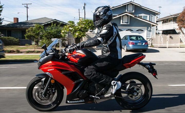 The Ninja is a very favorable motorcycle from the waist up. The bars place you virtually upright, and decent wind deflection is given from the screen. However, the high pegs present a tight squeeze for those with long legs.