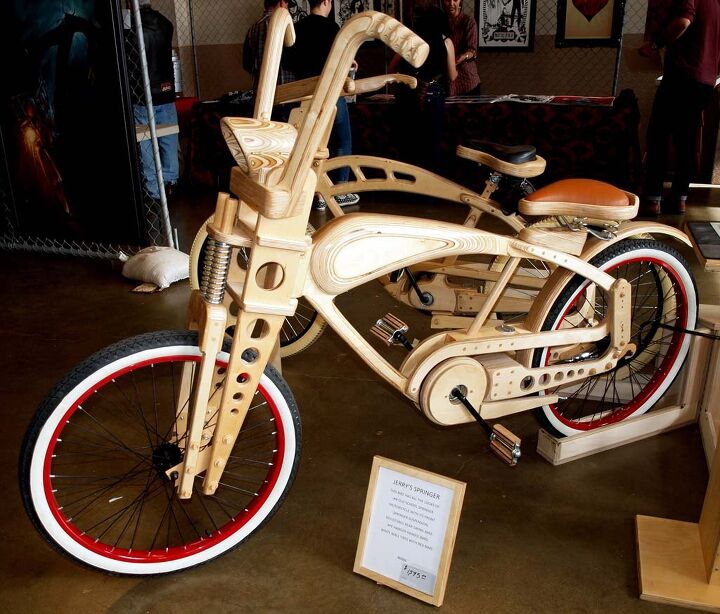 Best Wooden Bike without Splinters You Can Ride. Hand-built by Jerry Knight and featuring real springer suspension, adjustable swingarm, working headlight. A bargain at $1,595, with several different models available.