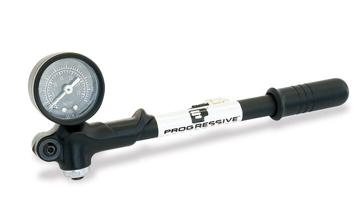 Accurately adjusting air pressure in a fork or shock can be aided by this Mini Gauge Pump from Progressive Suspension. Pressure can be bled without disconnecting the pump, and its 8-inch hose connector uses a one-way check valve to prevent dropped pressures during removal. MSRP: $54.95.