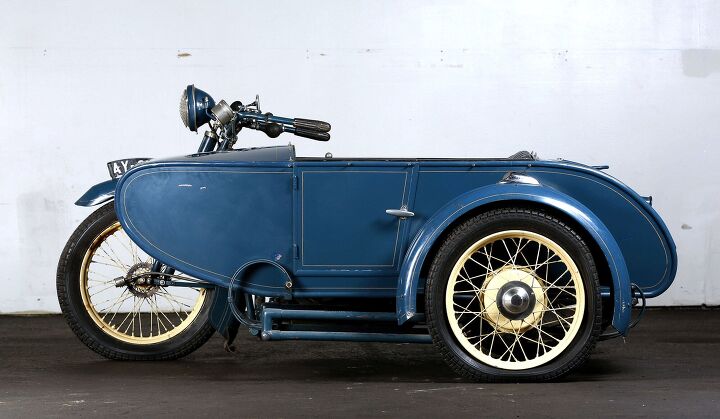 The Watsonian sidecar, in production from 1910-1956, presents  a sleek profile.