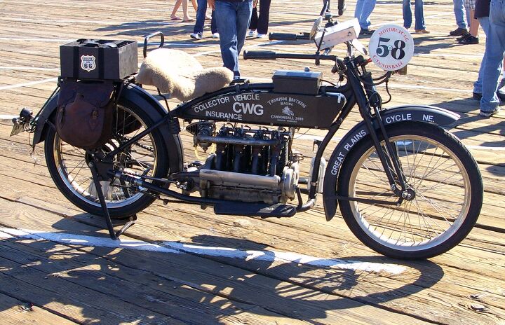 Kris Thompson’s 1915 Henderson Four “rolling billboard” that he rode in the 2010 Cannon Ball Run. For the 1915 model year Henderson offered the Model D and E with wheelbases of 65 and 58 inches, respectively. Standard bikes had a price tag of $295, the two-speed $325, a hefty sum at the time.