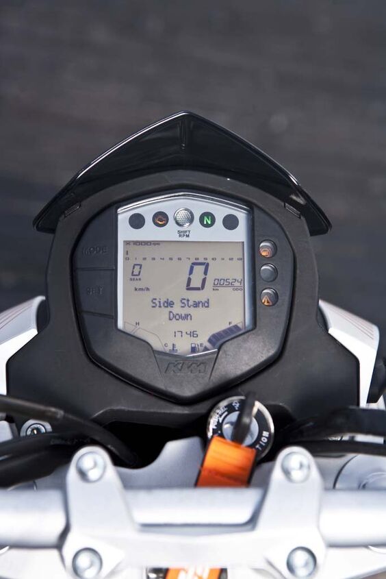 Comprehensive instrumentation includes easy-to-read digital speedo and a gear-position indicator, fuel economy info, a fuel gauge, temperature levels, and a programmable shift light. The tiny numerals on the tiny bar-graph tach frustrate.