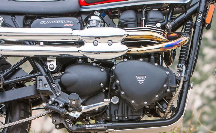The Triumph’s high-pipes do more than just look cool when navigating around and over off-road obstacles. The Trumpet also wears a bash plate below its frame rails, and carries 0.6 gallons more fuel: 4.2 gal/Triumph vs 3.6 gal/Ducati.