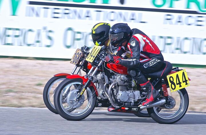 Evenly matched old Honda Twins provide much of the racing excitement.