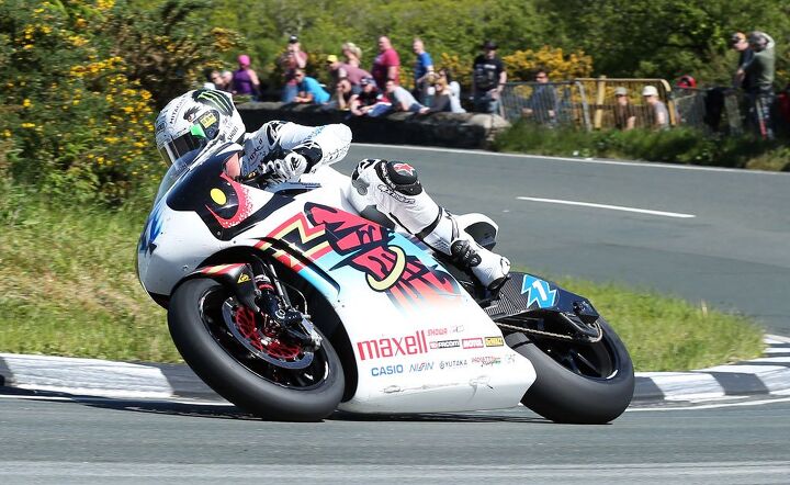 John McGuinness rode the Mugen Shinden Yon to victory in the TT Zero race by averaging more than 119 mph over the 37.7-mile lap. 