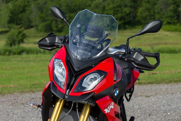 Asymmetric eyeballs are a BMW styling thing now. The XR inhales through its steering head just like the S1000RR. Somebody needs to build a screen to protect its big radiator (and oil cooler below it) from front tire roost.