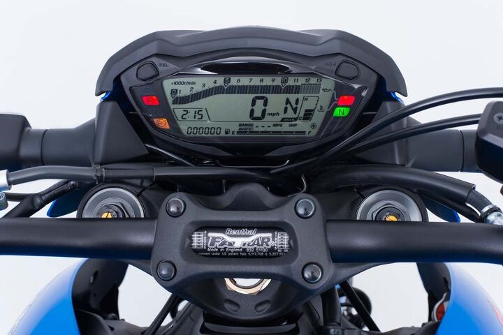 The backlighting is adjustable along with other things. Ride mode is usually displayed where the temp gauge is in this pic. My bike usually claimed it was getting around 44 mpg.