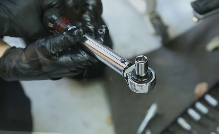 A torque wrench is a good investment that helps prevent you from stripping delicate threads.