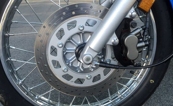 Both the Hyosung and Star utilize single discs in the front, both with two-piston calipers. Drum brakes slow the rear wheel. The Star’s disc (seen here) is 282mm compared to the 275mm disc on the Hyosung. Neither system is particularly noteworthy, but adequate for the job. That black cable is one end of the mechanical speedometer. Low tech at its finest.