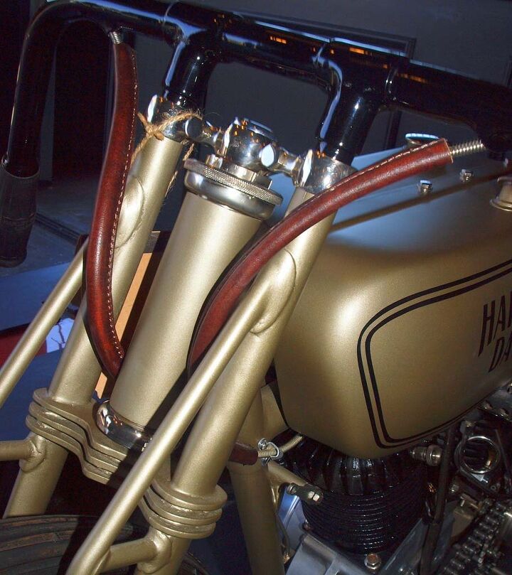 The bronze Harley is called “The Chicago Racer” and hails from 1923. Incredible detailing includes correct leather wrapping of cables.