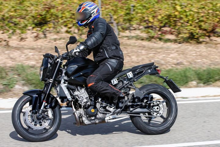 The ergonomics look to be similar to other KTM Dukes, with an upright riding position mixed with slightly rear-set pegs. Bracketry under the seat shows crude provisions for seat adjustments during development.