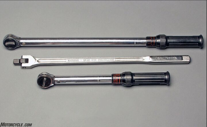 Use a tool for the task for which it was designed. Torque big bolts with a pound-feet-sized torque wrench (top) and little ones with a pound-inch one (bottom). Twist the crap out of a stuck fastener with a breaker bar (middle).