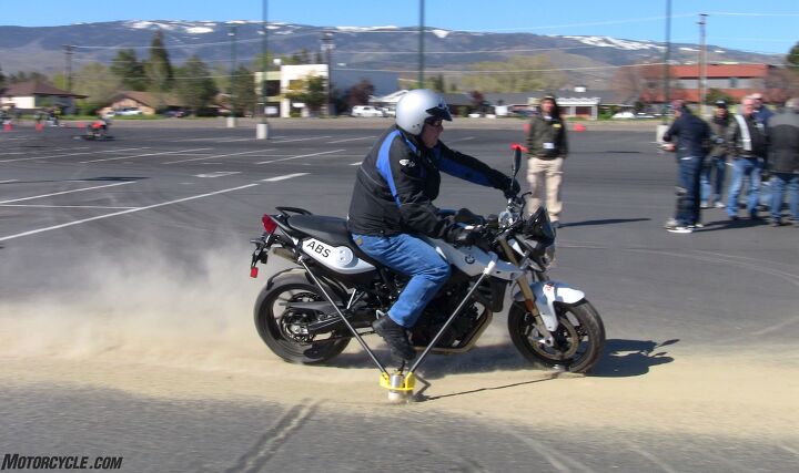 The International Driver & Rider Training Symposium had a sandspit available for ABS demonstrations. With the Skidbike’s ability to decrease traction, the reduced-traction stopping ability of ABS is also on display.