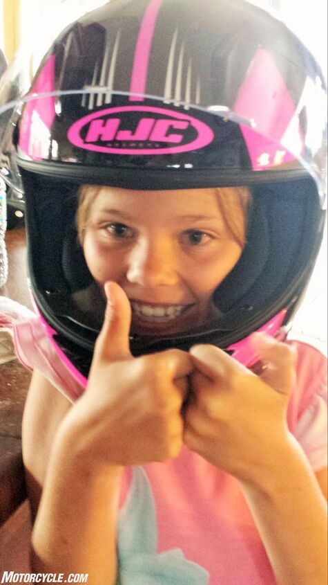 Now that she’s keen on riding, it’s time to properly gear her up. HJC is one of just a handful of helmet companies manufacturing youth-size helmets, and the CL-Y pictured here is notably smaller and lighter than an adult-sized HJC with a similar interior size.