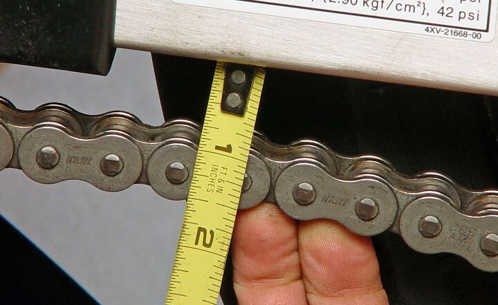 Once you’ve adjusted your chain a few times, you’ll get the feel for when it is loose, but the only way to be certain is to use a tape measure.