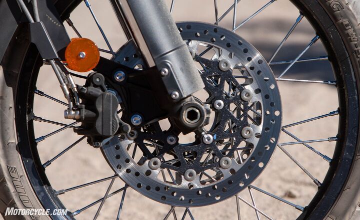 Twin front 308mm floating discs and Nissin 2-­piston calipers with switchable ABS provide ample stopping power on both paved and unpaved surfaces.
