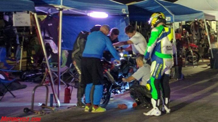 A rider change and bike check somewhere in the middle of the night.