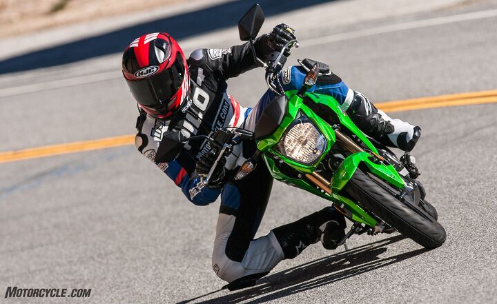 Skimming knee at a snail’s pace aboard the Kawasaki Z125 Pro.