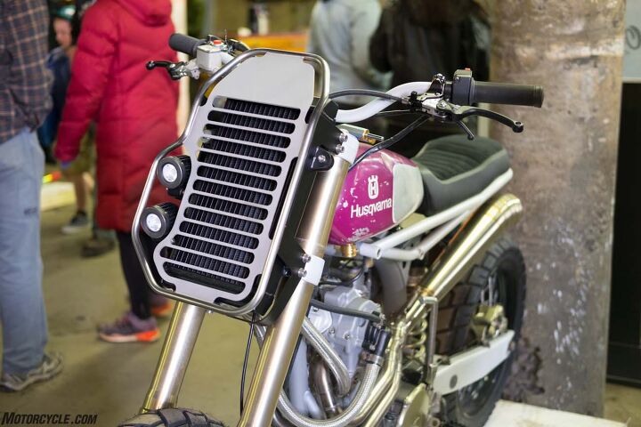 Finding new ways to stash big parts, MotoMucci’s radiator and headlight grill. 