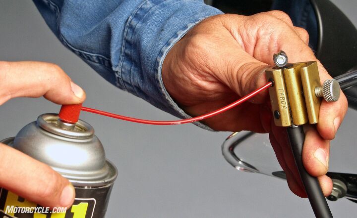 How to Lube Throttle and Clutch Cables - spraying silicone-based lubricant