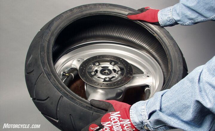 When mounting the new tire, you should be able to press most of the bead over the lip by hand. On the second bead, keeping the first one in the rim’s center depression will help.