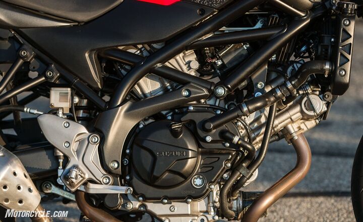 With its plethora of hoses, wires, and big Adam’s apple of an oil filter, the SV’s beauty is in the eye of the beer holder.