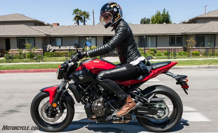 Vogue Manor indeed: Six-foot Tamara likes the FZ’s ergos but isn’t a big fan of the thin (but wide) seat. Note the full-size 180/55 rear tire and powerful four-piston brake calipers up front. The FZ is not a toy.