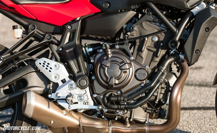 Kawasaki lifted the Z650’s frame directly from the FZ, which lifted the concept of flexy front engine mount ears directly from the M1 MotoGP machine. Both the FZ and Z650 turn right now.