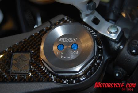 Seen here are the new adjustment points, rebound and compression damping, on the new 43mm Showa Big Piston Fork (BPF), that on the GSX-R1000 is also nitride coated.
