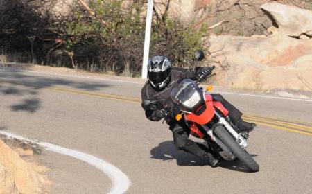 The littlest GS holds its own in the twisties thanks to a stable chassis, however, keeping the tach spinning around 6K rpm and above is necessary to keep faster riders or bigger bikes in sight.