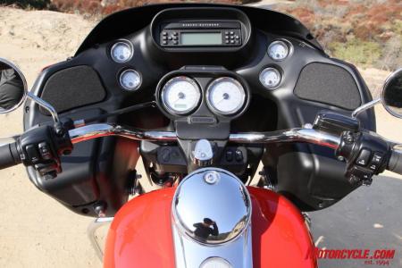 The Road Glide uses an array of analog dials for not only speed and rpm, but also for ambient air temp and oil pressure. A small LCD in the speedo provides mileage totals as well as a miles-remaining-until-empty counter. A single-disc CD player is part of the Harman/Kardon audio package.