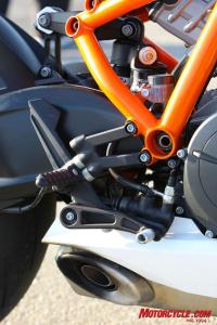 The RC8R’s footpegs and rear brake pedal peg (as well as the shifter peg) are just a couple examples of the way a rider can adjust the KTM to suit riding style or fit. Note the eccentric on the upper rear of the shock linkage is used for ride-height adjustments. Even more impressive is how easily the shock is accessed.