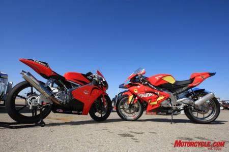 On the left is the Moriwaki MD250H powered by a four-stroke Honda motor. On the right is the Aprilia RS125, one of the last sport motorcycles available with a two-stroke engine.