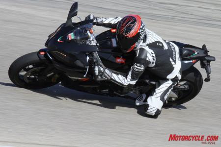 The RSV4 R, like the Honda, is down on peak horsepower big time to the S1000RR, but the Aprilia’s compact feel and centralized mass equate to a bike that’s easy to flick confidently into the corners.