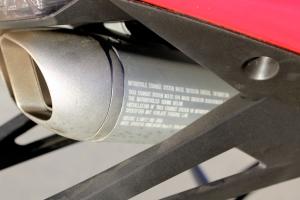 The 250R’s undertail muffler makes big noises. It is stamped EPA-legal, but we were still wondering how it got through.