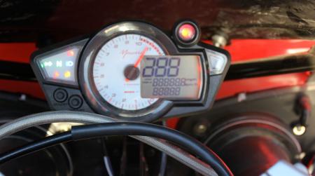 Turn the key, and the tach sweeps and instrument lights simulate what you see during a pre-start-up diagnostic check. In operation the tach on our test bike would not stay steady, and overall, we found the cluster to be too small. 