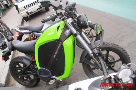 No, it’s not “Kawasaki green,” as some people have commented. It’s Brammo Subliminal Green! It can also be had in a light blue, burnt orange, white, and grayish-silver.